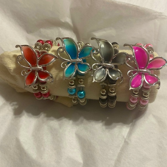 Source Unknown Jewelry - Double strand butterfly stretch bracelets; you get all 4 of them. NWOT